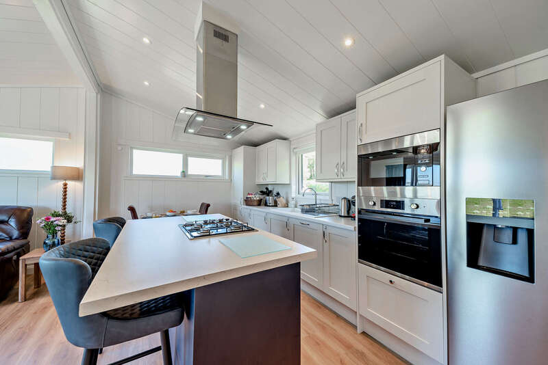 Kitchen inside glencoe executive with breakfast bar